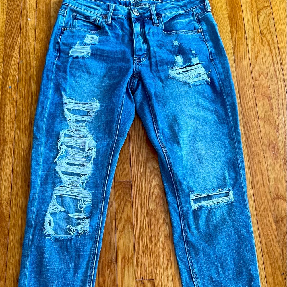 American Eagle Outfitters Distressed light blue button fly jeans, size 2P slim